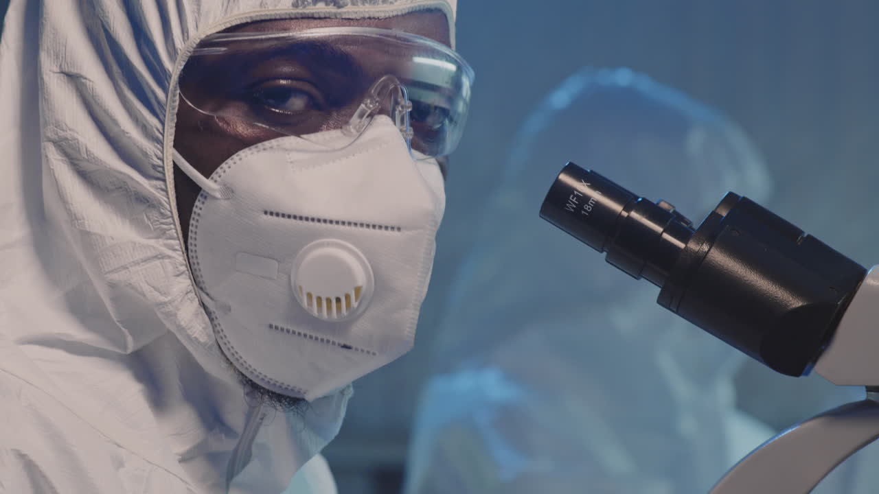 Portrait of Male Epidemiologist in Coveralls