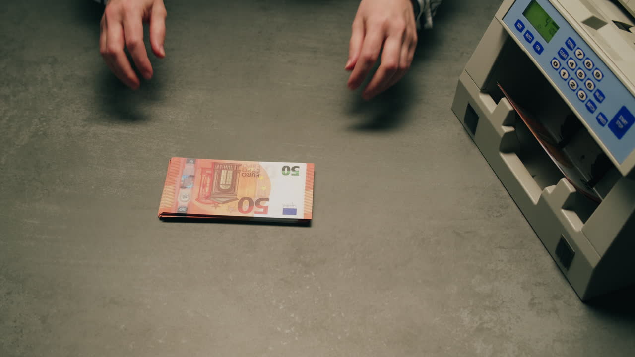 Specialised police officer Counting dollar banknotes in crime lab, conceptual image. High quality 4k footage