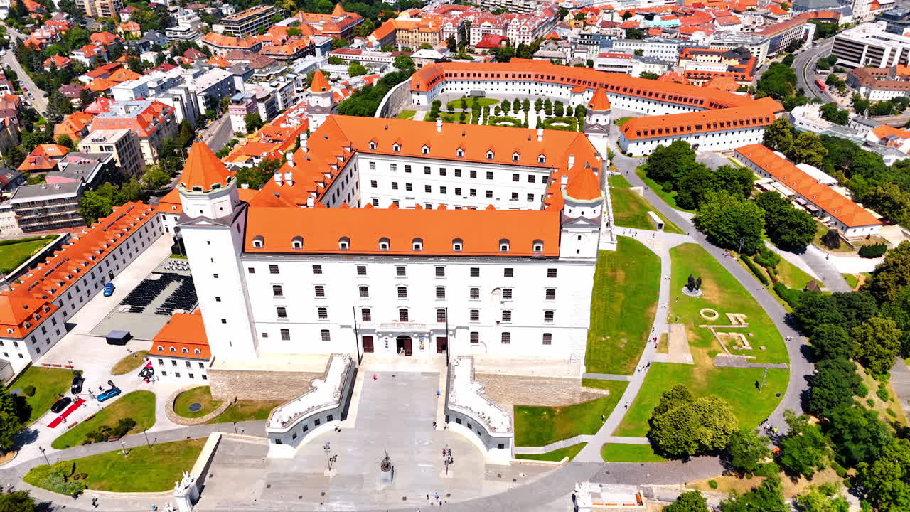 Footage over the orange roof of the Bratislava Castle in Slovakia. Beautiful landmark in the old town of the city