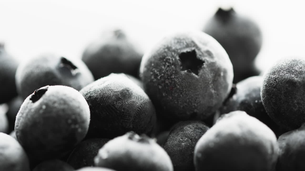 하 ⁇  배경에 복사 공간과 함께 블루베리의 마이크로 비디오