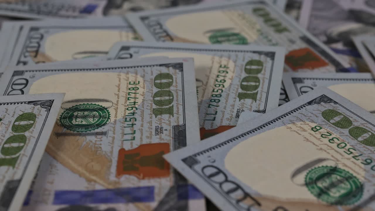 Currency one hundred US dollar banknotes close-up