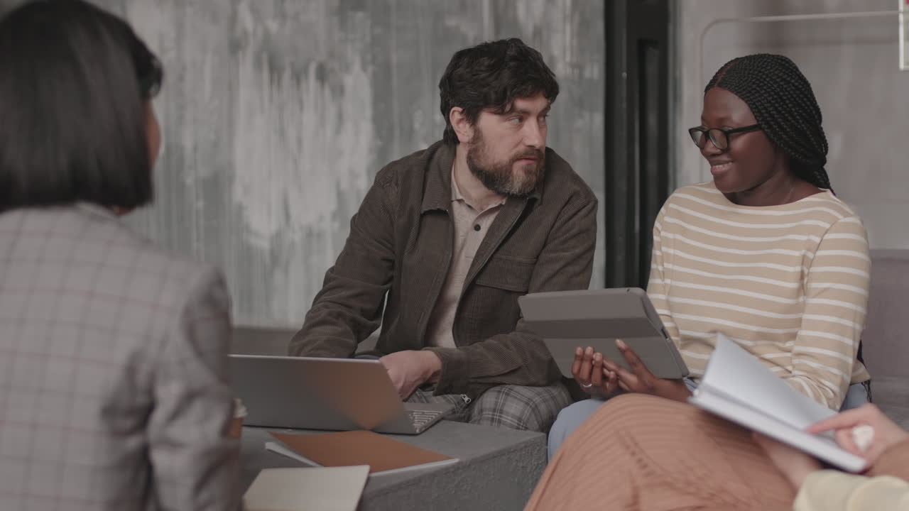 Coworkers Talking on Meeting