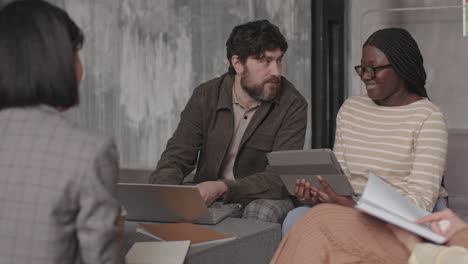 coworkers talking on meeting