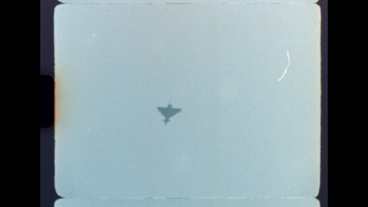 Airplane Silhouette on Film Grain