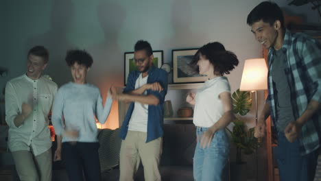 friends dancing at home