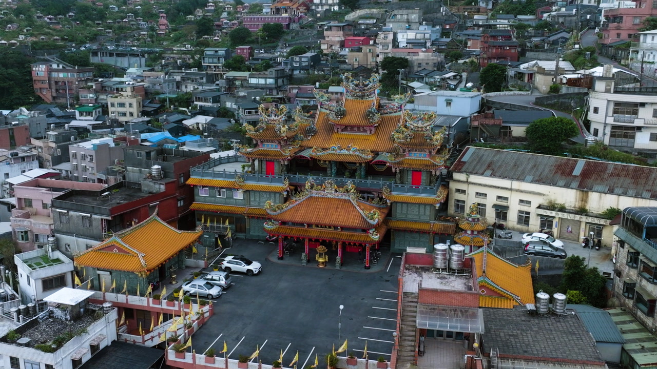 Aerial view of Jiufen Shengming Temple with traditional ornate architecture, Taiwan