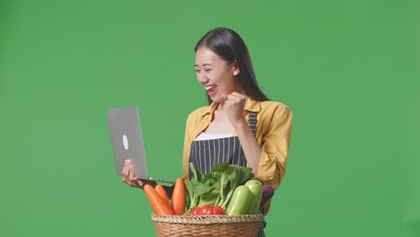 happy woman online selling vegetables