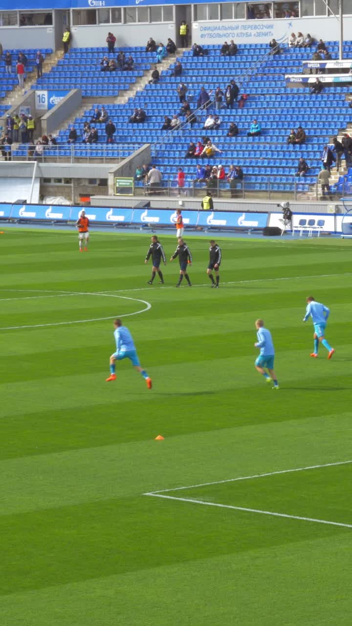 Soccer Players Training at Stadium