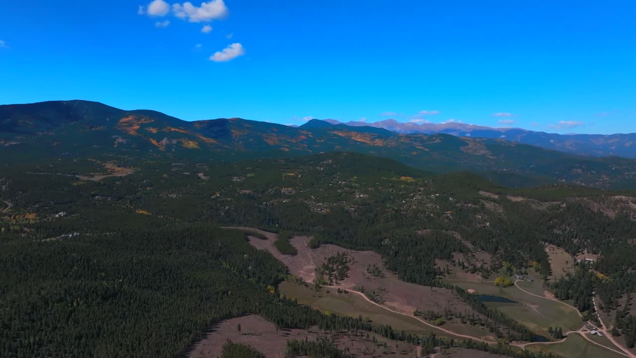 Peak fall autumn colors Conifer Evergreen Colorado Mount Blue Sky Evans aerial drone Maxwell falls historic scenic byway echo lake sunny morning 14er peaks summit Shadow Mountain wide forward motion