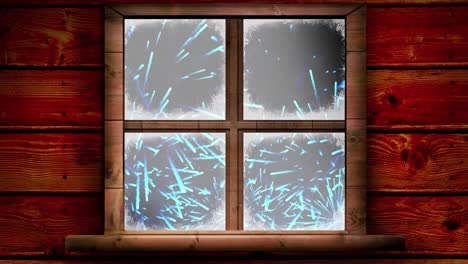 Wooden-window-frame-against-blue-fireworks-exploding-on-black-background