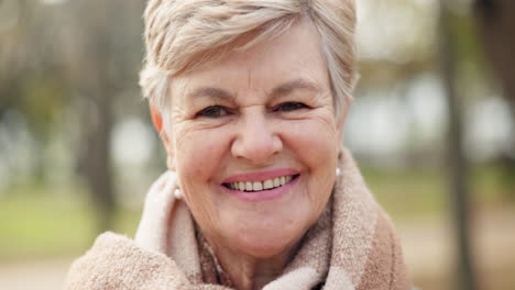 happy, portrait and senior woman in the park