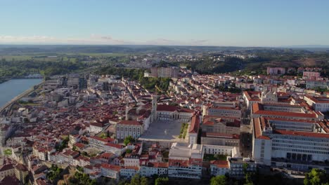 aerial - coimbra, portugal, highlighting the paço das escolas and historic university courtyard