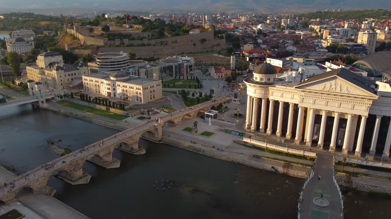 Drone view overlooking Skopje City Centre and Vardar Riverside at sunset - Macedonia