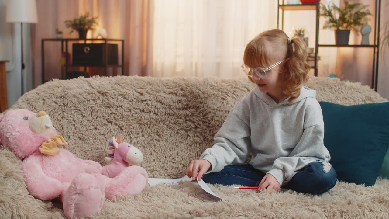 Young teenager girl pretending teacher at home sofa math lesson toy students playful serious act