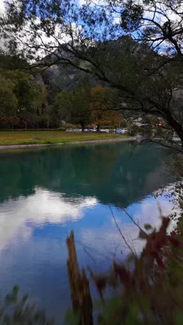 swiss alpine lake walen walensee nature aerial drone vertical video highlands