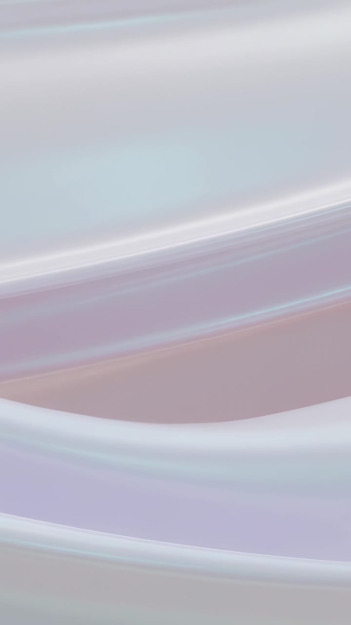 Vertical video: Starting slow camera pan, draped fabric shifting in studio revealing pastel bands