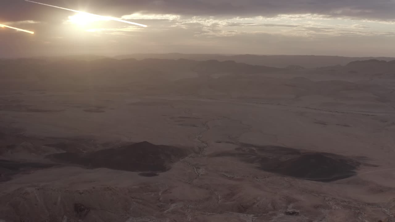 Desert Landscape with Meteor Shower at Sunset