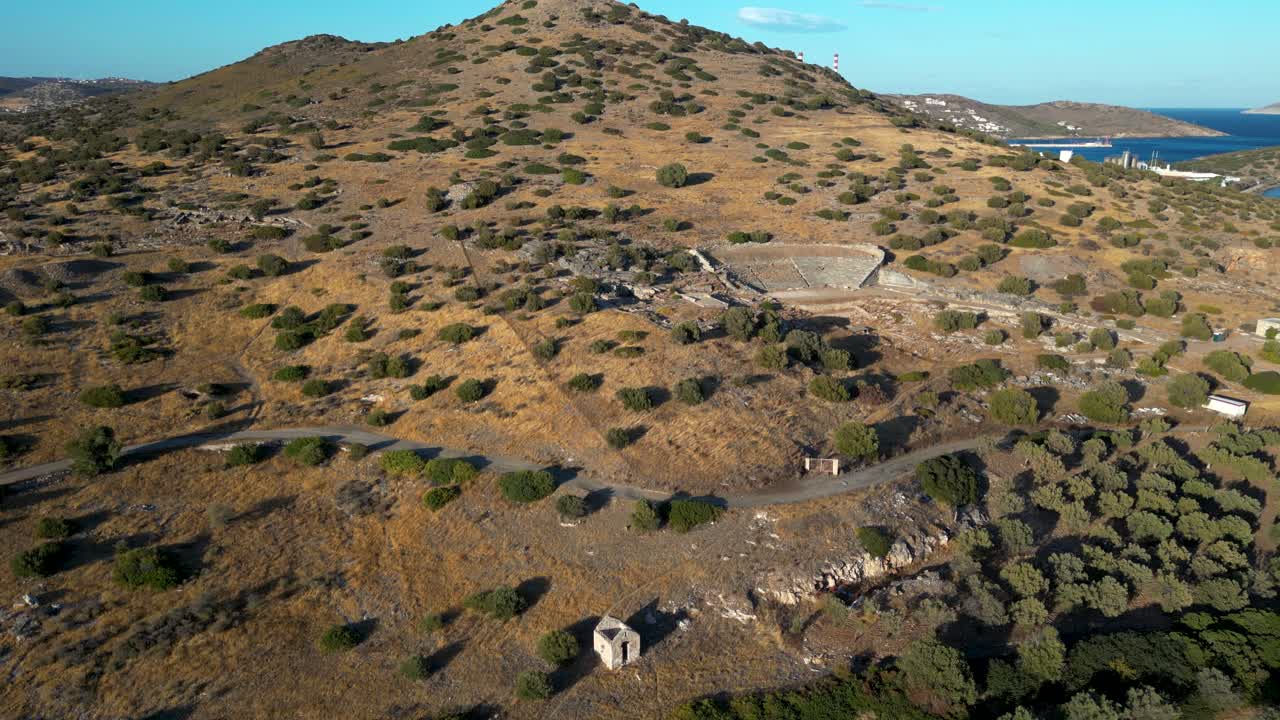 Slow cinematic drone tilt up over Ancient Theatre of Thorikos near Athens, Greece