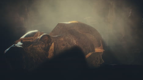 a head of the giant ancient deity statue hidden in a cave