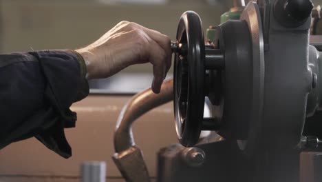 person works on outer diameter grinder