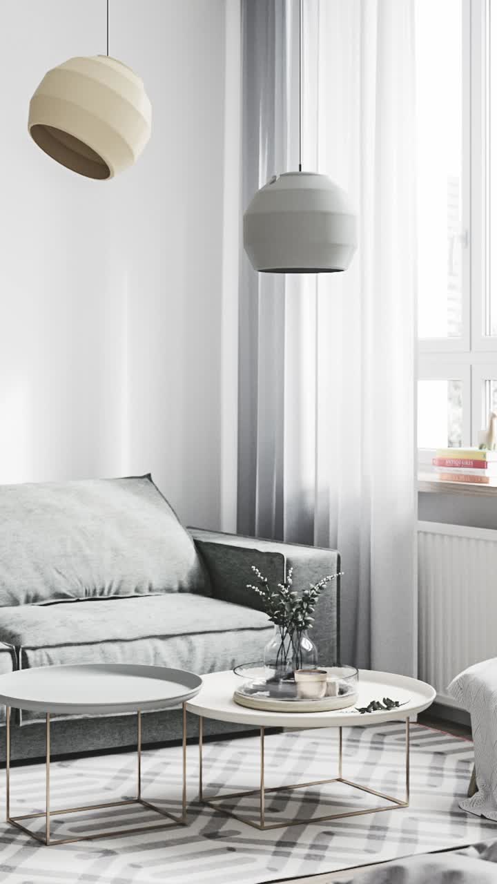 Design moderno per un soggiorno con arredamento semplice e luce naturale