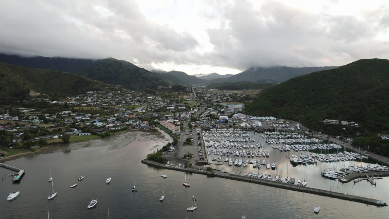 Aerial view away from the Waikawa marina and village, gloomy evening in NZ