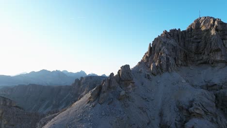 The-Dolomites-present-a-mesmerizing-scene-of-craggy-mountain-ranges,-with-deep-ravines-and-eroded-cliffs