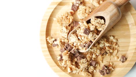 home made musli in a bowl on black