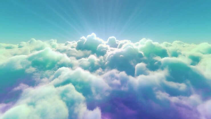Aerial View Flying Above Vibrant Clouds at Sunrise