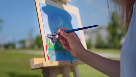 woman painting outdoors