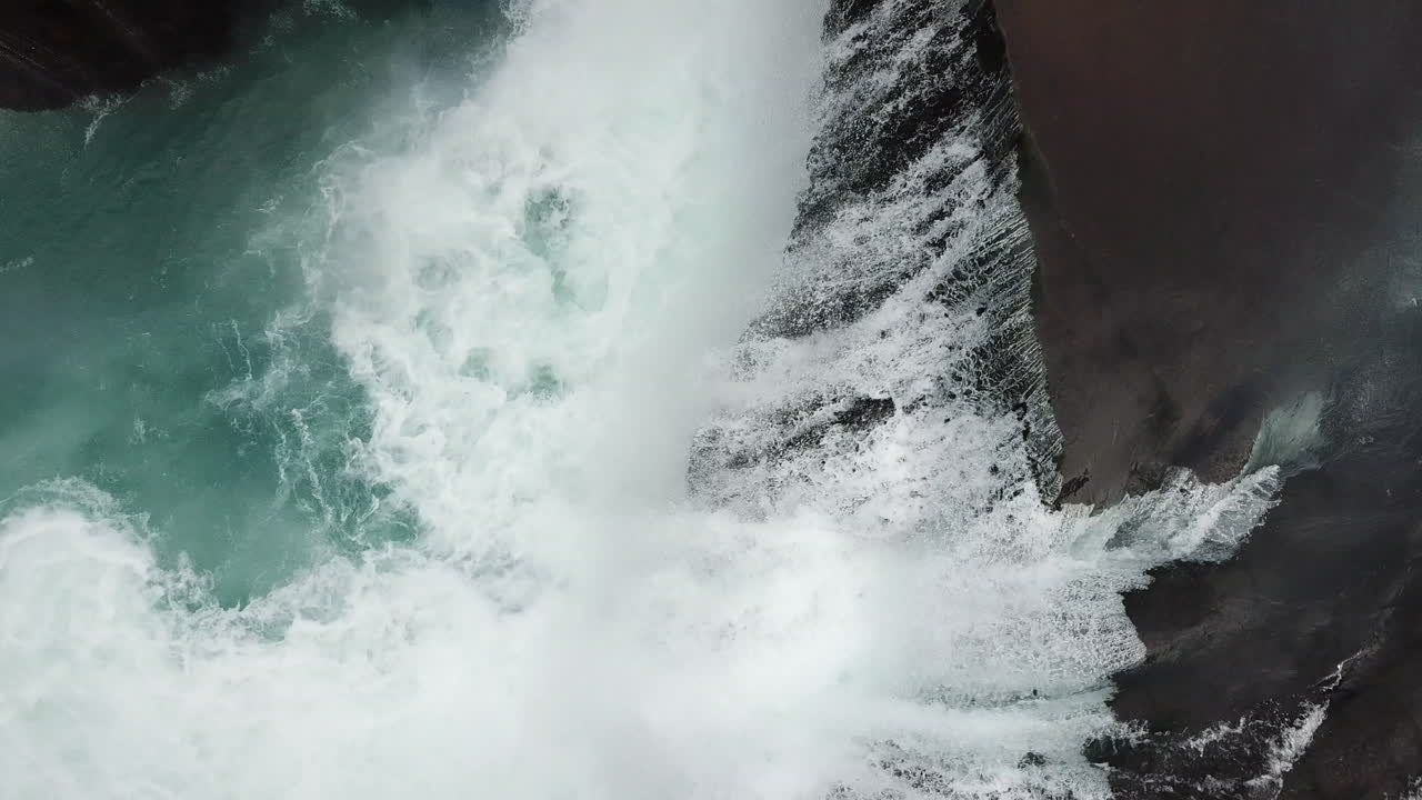 Majestic Waterfall in Highlands of Iceland, Top erial View of Glacial Water Falls Down in Canyon