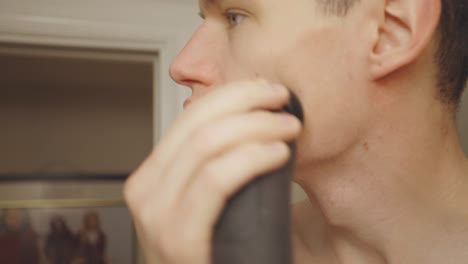 Close-Up-Portrait-Of-A-Caucasian-Guy-Shaving.