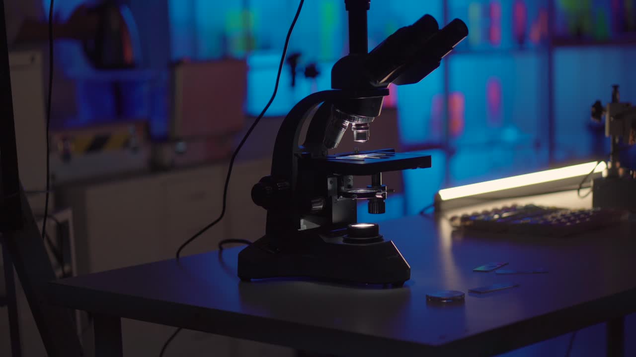 Microscope in a Laboratory Setting at Night