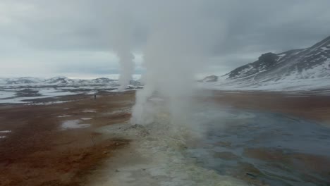 namafjall hverir geothermal area in iceland. stunning landscape of sulfur valley with smoking fumaroles. aerial view