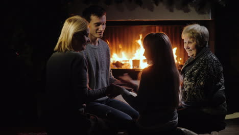 gezellige familiespelen bij de open haard hebben het gezellig samen