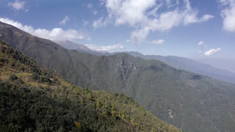 Beautiful-Mount-Cangshan-hillside-covered-in-forest,-Yunnan-China,-aerial-view