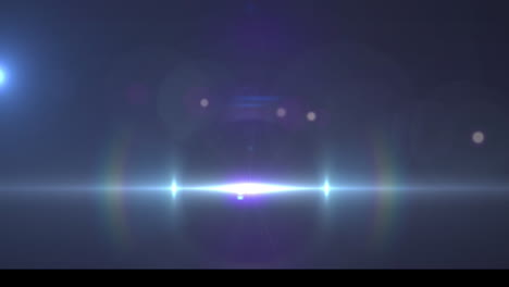 animation of glowing lights moving on blue background