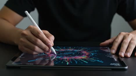 A Creative Mind Engaged in Digital Art on a Tablet, Showcasing Precision with a Stylus on a Colorful Graphic Interface Design