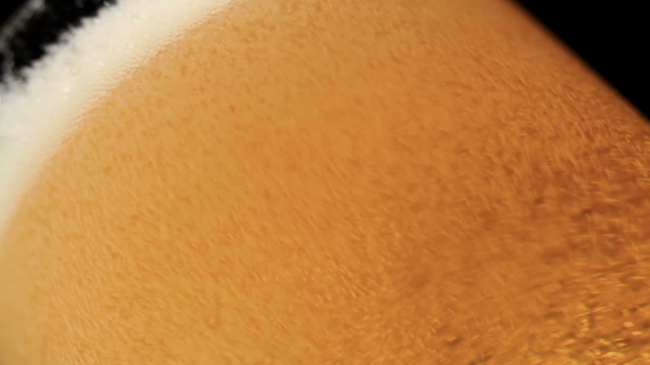 Pouring beer Macro shot Low angle