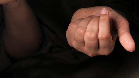 woman holding a ring in her hand