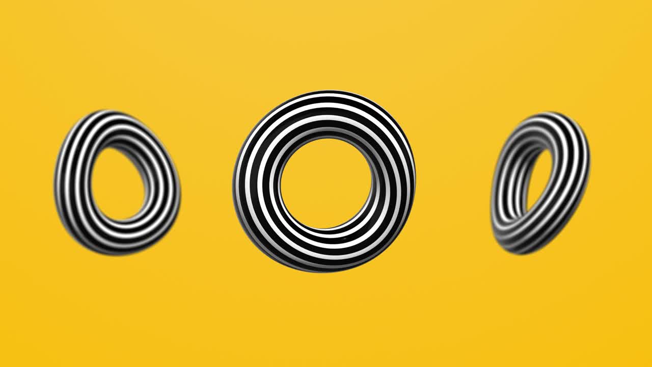 줄무 반지가 회전하는 추상적인 3d 애니메이션
