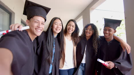 Diverse-group-of-students-celebrates-graduation