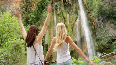 friends enjoying a waterfall view