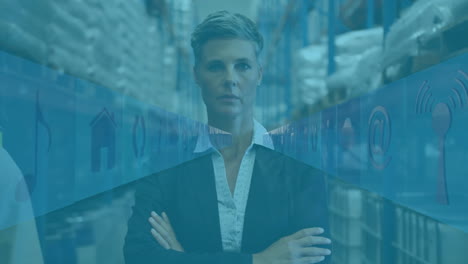 animation of media icons over diverse workers in warehouse