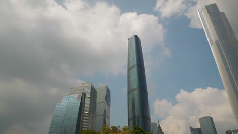 day time guangzhou city downtown famous buildings slow motion up view 4k china