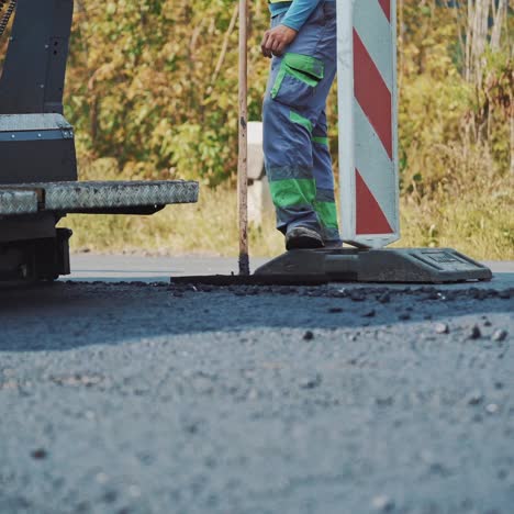 teamwork at asphalt construction