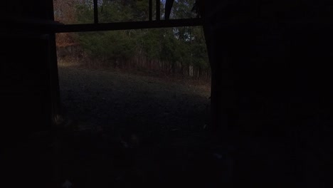 Drone-flying-thru-empty-tobacco-barn