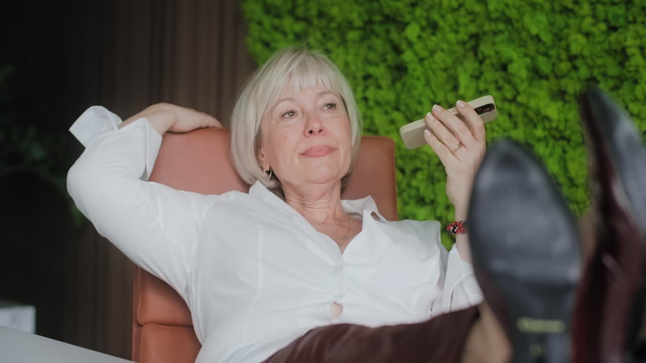 Relaxing Businesswoman in the Office