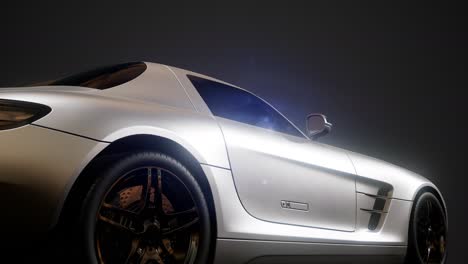 luxury sport car in dark studio with bright lights