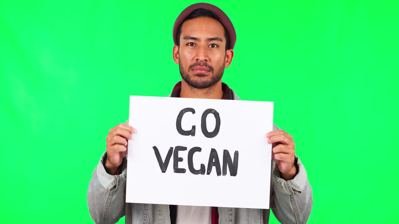 Green screen, protest and man with a go vegan